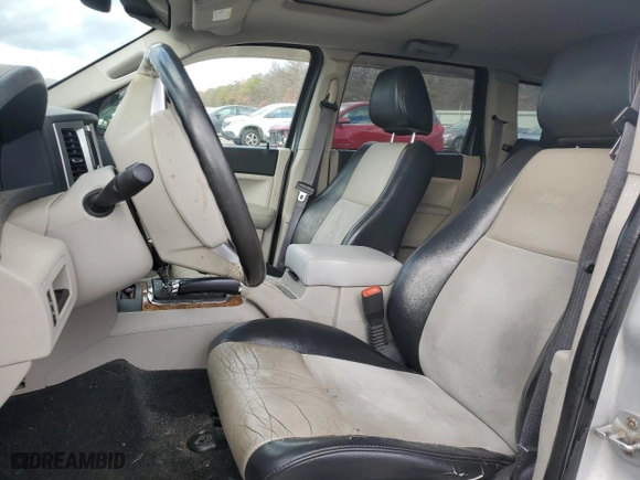 2009 Jeep Grand Cherokee Limited with VIN 1J8HR58T69C523337, listed as a Copart auction lot 82992464 with 156,522 mi miles and Salvage Title. Bid and sale history available at carsss.com. Image 7.