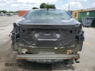 2015 Ford Fusion SE Hybrid with VIN 3FA6P0LUXFR220930, listed as a Copart auction lot 58407235 with 179,682 mi miles and Salvage title. Bid and sale history available at DreamBid. Image 6.