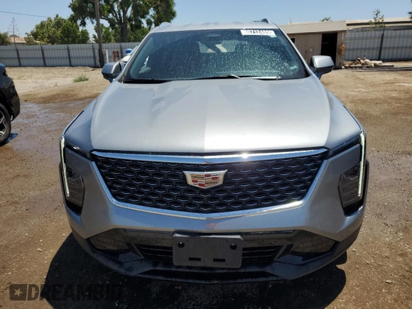 2024 Cadillac XT4 AWD Premium Luxury with VIN 1GYFZDR48RF153128, listed as a Copart auction lot 60712485 with 14,765 mi miles and Salvage title. Bid and sale history available at DreamBid. Image 5.