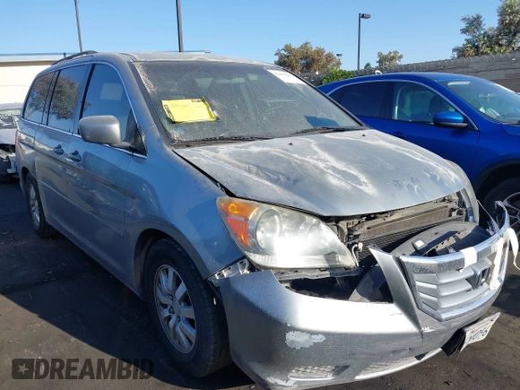 2010 Honda Odyssey EX with VIN 5FNRL3H41AB016671, listed as a IAAI auction lot 42465200 with 167,214 mi miles and . Bid and sale history available at DreamBid. Image 1.