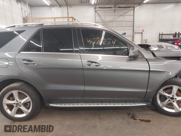 2018 Mercedes-Benz GLE 350 with VIN 4JGDA5JB3JA997403, listed as a IAAI auction lot 41776274 with 104,359 mi miles and . Bid and sale history available at DreamBid. Image 14.