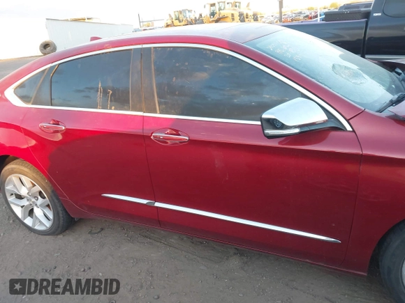 2014 Chevrolet Impala LTZ z VIN 1G1155S32EU141591, wystawiony jako IAAI lot #42150675 z przebiegiem Nie podano mil oraz . Historia ofert i sprzedaży dostępna na DreamBid. Obrazek 13.