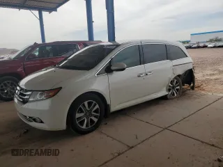 2017 Honda Odyssey Touring with VIN 5FNRL5H94HB007979, listed as a Copart auction lot 56755435 with 125,821 mi miles and Salvage title. Bid and sale history available at DreamBid. Image 1.