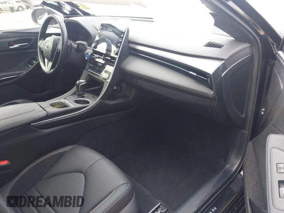 2021 Toyota Avalon Hybrid XSE z VIN 4T1EA1AB2MU002741, wystawiony jako IAAI lot #41865444 z przebiegiem 141 196 mil mil oraz . Historia ofert i sprzedaży dostępna na DreamBid. Obrazek 5.