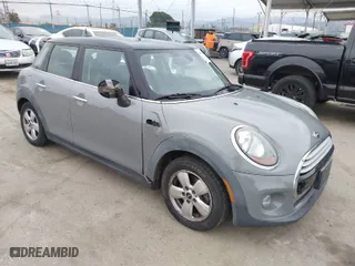 2015 MINI Cooper Hardtop 4 Door with VIN WMWXS5C56FT830080, listed as a IAAI auction lot 42064819 with 145,363 mi miles. Bid and sale history available at carsss.com. Image 1.