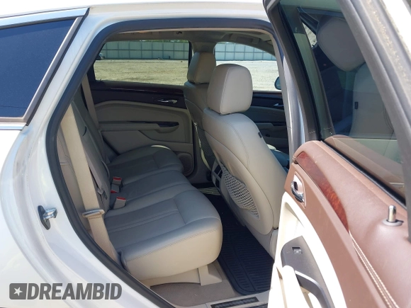 2013 Cadillac SRX Performance Collection with VIN 3GYFNDE34DS530275, listed as a IAAI auction lot 42148040 with 244,929 mi miles. Bid and sale history available at carsss.com. Image 8.