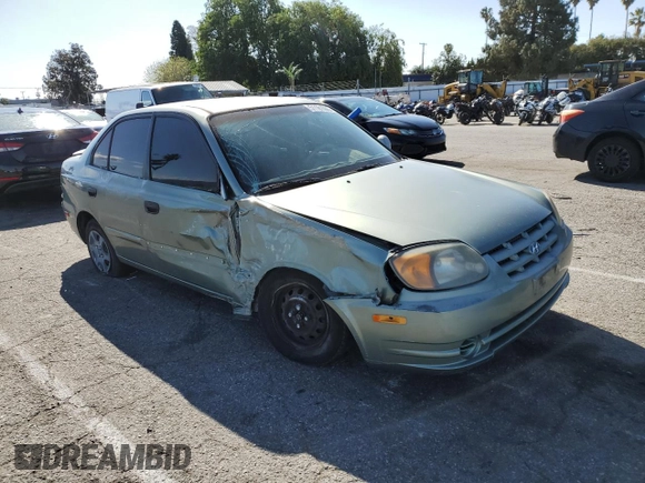 2004 Hyundai Accent GL with VIN KMHCG45C44U533952, listed as a Copart auction lot 51181095 with 88,446 mi miles and Salvage Title. Bid and sale history available at carsss.com. Image 4.
