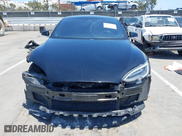 2017 Tesla Model S 60 with VIN 5YJSA1E17HF232699, listed as a IAAI auction lot 42327539 with 113,923 mi miles and . Bid and sale history available at DreamBid. Image 13.