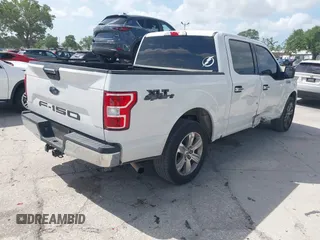 2018 Ford F-150 XL with VIN 1FTEW1CB8JFC47174, listed as a IAAI auction lot 41956391 with 148,337 mi miles. Bid and sale history available at carsss.com. Image 4.