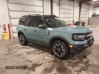 2022 Ford Bronco Sport Outer Banks z VIN 3FMCR9C67NRD99094, wystawiony jako IAAI lot #42332027 z przebiegiem 42 653 mil mil oraz . Historia ofert i sprzedaży dostępna na DreamBid. Obrazek 1.