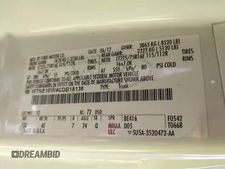 2012 Ford Econoline Cargo Commercial with VIN 1FTNE1EW4CDB18138, listed as a IAAI auction lot 41416843 with 285,734 mi miles and . Bid and sale history available at carsss.com. Image 9.