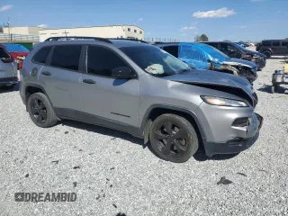 2016 Jeep Cherokee Altitude with VIN 1C4PJLAB8GW324673, listed as a Copart auction lot 50085625 with 117,588 mi miles and Salvage title. Bid and sale history available at DreamBid. Image 4.