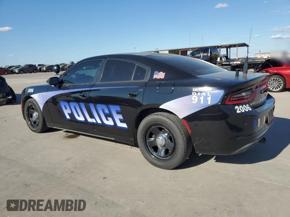 2019 Dodge Charger Police with VIN 2C3CDXAGXKH753432, listed as a Copart auction lot 71969554 with 77,385 mi miles and Clean Title. Bid and sale history available at DreamBid. Image 2.
