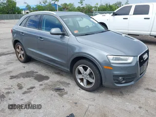 2015 Audi Q3 Premium Plus z VIN WA1EFCFS4FR009507, wystawiony jako IAAI lot #42779269 z przebiegiem 136 442 mil mil oraz . Historia ofert i sprzedaży dostępna na DreamBid. Obrazek 1.