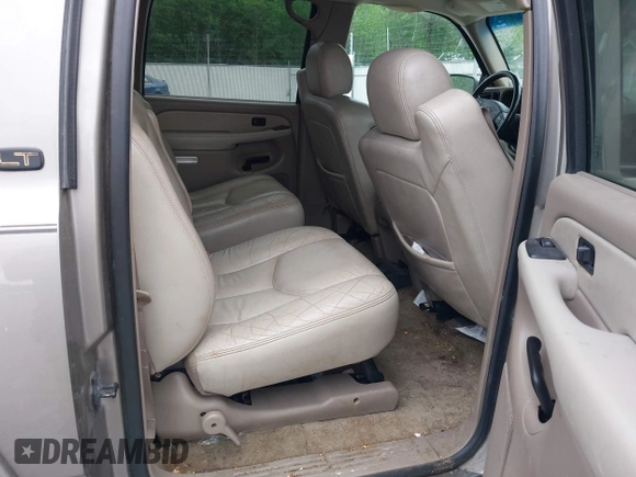 2003 Chevrolet Suburban LT z VIN 1GNEC16Z13J140136, wystawiony jako IAAI lot #42142827 z przebiegiem 252 698 mil mil oraz . Historia ofert i sprzedaży dostępna na DreamBid. Obrazek 8.