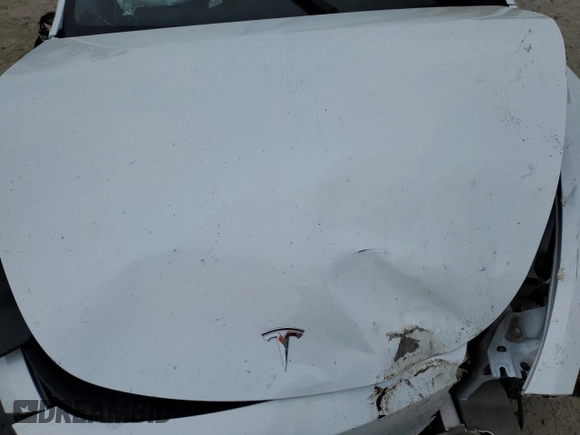 2021 Tesla Model Y Standard Range z VIN 5YJYGDED1MF109091, wystawiony jako Copart lot #50414004 z przebiegiem Nie podano mil oraz Szkody całkowita. Historia ofert i sprzedaży dostępna na DreamBid. Obrazek 12.