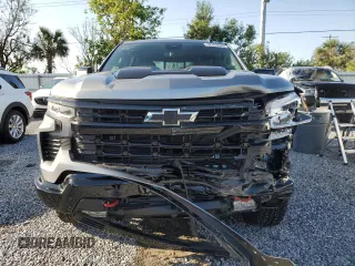 2025 Chevrolet Silverado 1500 with VIN 3GCUKFE80SG128699, listed as a Copart auction lot 52393645 with 5,759 mi miles and Salvage Title. Bid and sale history available at DreamBid. Image 5.