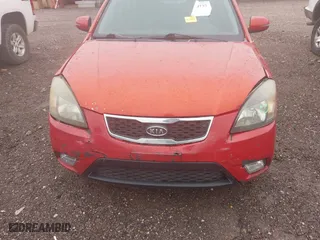 2011 Kia Rio LX with VIN KNADH4A33B6714471, listed as a IAAI auction lot 41970737 with 188,214 mi miles. Bid and sale history available at carsss.com. Image 6.