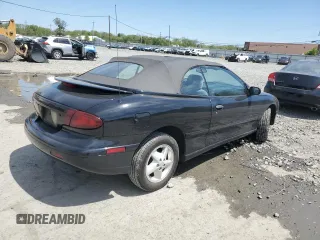 1998 Pontiac Sunfire z VIN 4G2JB32T1WB201350, wystawiony jako Copart lot #53074805 z przebiegiem 128 486 mil mil oraz Szkody całkowita. Historia ofert i sprzedaży dostępna na DreamBid. Obrazek 3.