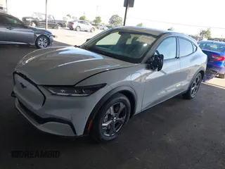 2023 Ford Mustang Mach-E Select with VIN 3FMTK1RM8PMA41028, listed as a IAAI auction lot 42564264 with 34,373 mi miles and . Bid and sale history available at DreamBid. Image 2.