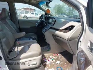 2015 Toyota Sienna XLE with VIN 5TDYK3DC8FS654902, listed as a IAAI auction lot 41953705 with 169,036 mi miles. Bid and sale history available at carsss.com. Image 5.