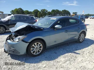 2015 Mazda 3 i Touring with VIN 3MZBM1L77FM208259, listed as a Copart auction lot 64437015 with 114,488 mi miles and Salvage title. Bid and sale history available at DreamBid. Image 1.