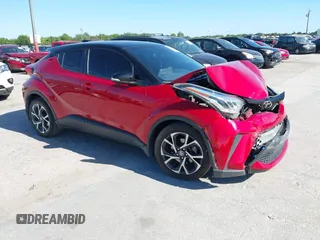2020 Toyota C-HR LE with VIN JTNKHMBX3L1066720, listed as a IAAI auction lot 42042139 with 98,925 mi miles and . Bid and sale history available at DreamBid. Image 1.