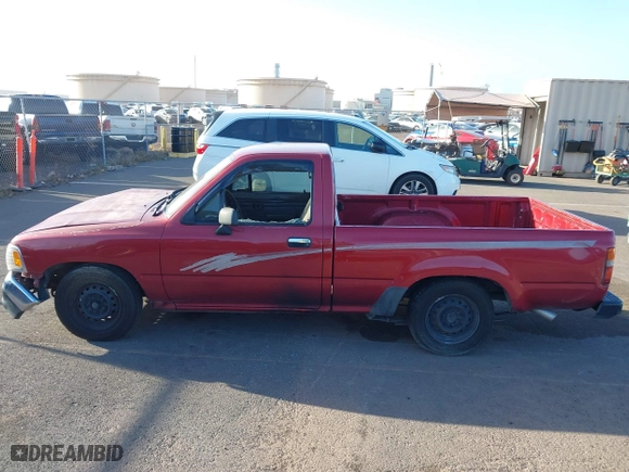 1993 Toyota 2WD Pickups DX with VIN JT4RN81P1P5162011, listed as a IAAI auction lot 41721589 with 207,489 mi miles. Bid and sale history available at carsss.com. Image 14.