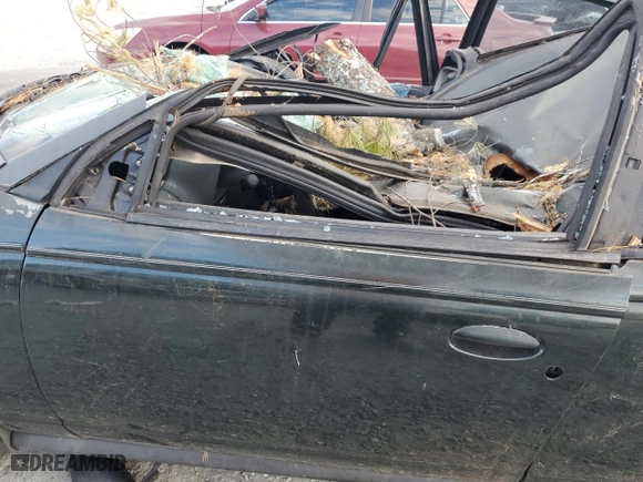 1999 Saturn SL with VIN 1G8ZJ5276XZ106206, listed as a Copart auction lot 75212184 with 0 mi miles and Salvage Title. Bid and sale history available at carsss.com. Image 7.