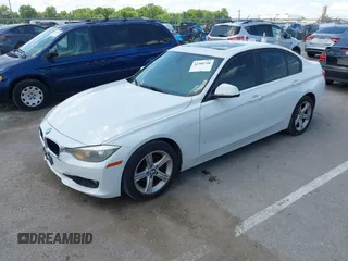 2014 BMW 3 Series 328i with VIN WBA3A5C5XEP602723, listed as a IAAI auction lot 42380748 with 127,492 mi miles and . Bid and sale history available at DreamBid. Image 2.
