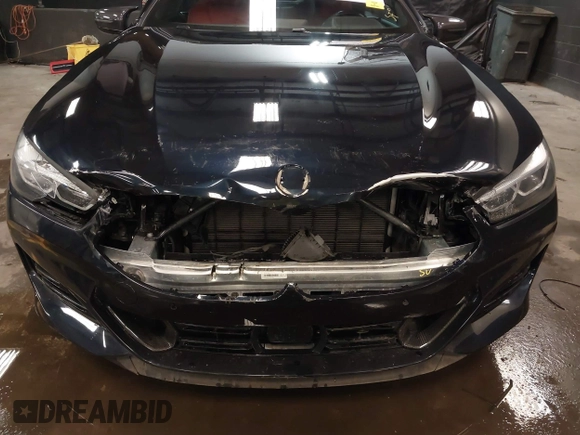 2023 BMW 8 Series with VIN WBAFY4C01PCM52812, listed as a IAAI auction lot 41967777 with 12,490 mi miles and . Bid and sale history available at DreamBid. Image 6.