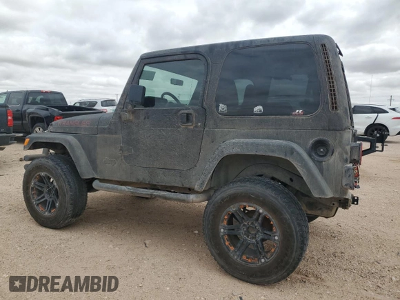 1998 Jeep Wrangler Sahara with VIN 1J4FY49S0WP749826, listed as a Copart auction lot 55174205 with 203,574 mi miles and Salvage title. Bid and sale history available at DreamBid. Image 2.