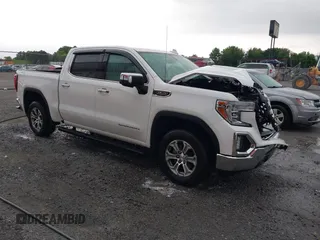 2021 GMC Sierra 1500 SLT z VIN 3GTU9DED4MG261384, wystawiony jako IAAI lot #42161232 z przebiegiem 36 685 mil mil oraz . Historia ofert i sprzedaży dostępna na DreamBid. Obrazek 1.