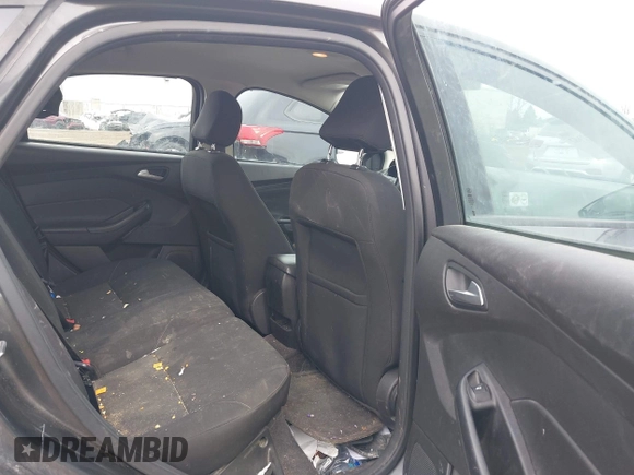 2015 Ford Focus SE with VIN 1FADP3K27FL303111, listed as a IAAI auction lot 41802182 with 195,834 mi miles and . Bid and sale history available at DreamBid. Image 8.