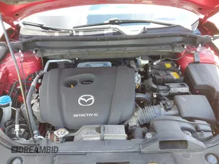 2021 Mazda CX-5 Touring z VIN JM3KFBCM1M0401717, wystawiony jako IAAI lot #42036407 z przebiegiem 35 587 mil mil oraz . Historia ofert i sprzedaży dostępna na DreamBid. Obrazek 10.