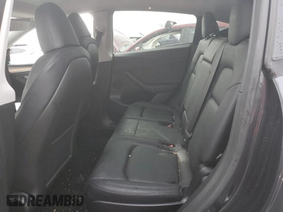 2024 Tesla Model Y Long Range with VIN 7SAYGAEE7RF043096, listed as a Copart auction lot 46939395 with 12,521 mi miles and Salvage Title. Bid and sale history available at DreamBid. Image 10.