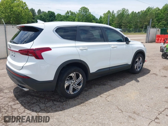 2023 Hyundai Santa Fe SE with VIN 5NMS14AJ9PH630176, listed as a IAAI auction lot 42202536 with 26,624 mi miles and . Bid and sale history available at DreamBid. Image 4.