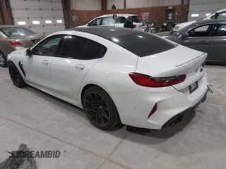 2020 BMW M8 with VIN WBSGV0C06LCE47698, listed as a IAAI auction lot 41457199 with 50,772 mi miles. Bid and sale history available at carsss.com. Image 3.