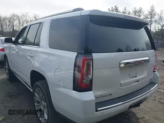 2016 GMC Yukon Denali with VIN 1GKS2CKJ9GR334645, listed as a IAAI auction lot 41781040 with 141,405 mi miles. Bid and sale history available at carsss.com. Image 3.