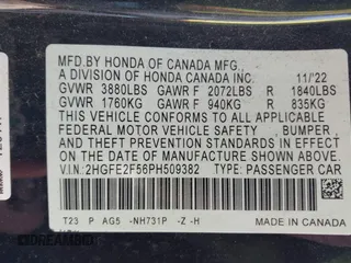 2023 Honda Civic Sport with VIN 2HGFE2F56PH509382, listed as a IAAI auction lot 42296205 with 125,584 mi miles and . Bid and sale history available at DreamBid. Image 9.