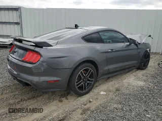 2021 Ford Mustang GT z VIN 1FA6P8CF8M5133205, wystawiony jako Copart lot #46677945 z przebiegiem Nie podano mil oraz Tytuł czysty. Historia ofert i sprzedaży dostępna na DreamBid. Obrazek 3.