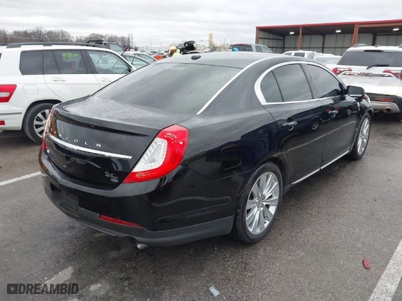 2016 Lincoln MKS EcoBoost with VIN 1LNHL9FT9GG600075, listed as a IAAI auction lot 41214769 with 60100 miles. Bid and sale history available at carsss.com. Image 4.