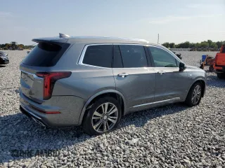2021 Cadillac XT6 Premium Luxury z VIN 1GYKPCRS5MZ197527, wystawiony jako Copart lot #55952185 z przebiegiem 24 856 mil mil oraz Szkody całkowita. Historia ofert i sprzedaży dostępna na DreamBid. Obrazek 3.
