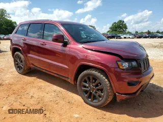 2017 Jeep Grand Cherokee Altitude with VIN 1C4RJEAG9HC702924, listed as a Copart auction lot 57897805 with 133,796 mi miles and Salvage title. Bid and sale history available at DreamBid. Image 4.