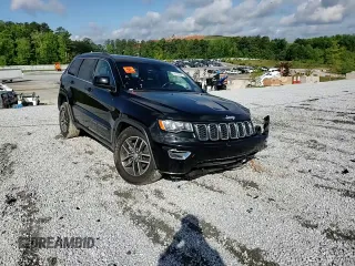 2018 Jeep Grand Cherokee Laredo E with VIN 1C4RJEAGXJC246874, listed as a Copart auction lot 56722005 with 101,493 mi miles and Salvage title. Bid and sale history available at DreamBid. Image 14.
