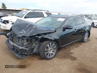 2014 Kia Cadenza Premium z VIN KNALN4D70E5129618, wystawiony jako IAAI lot #42023255 z przebiegiem 125 650 mil mil oraz . Historia ofert i sprzedaży dostępna na DreamBid. Obrazek 2.