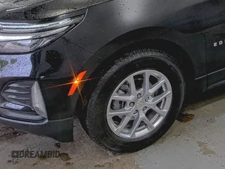2023 Chevrolet Equinox LT z VIN 3GNAXJEG9PL117916, wystawiony jako IAAI lot #42379407 z przebiegiem 10 577 mil mil oraz . Historia ofert i sprzedaży dostępna na DreamBid. Obrazek 1.