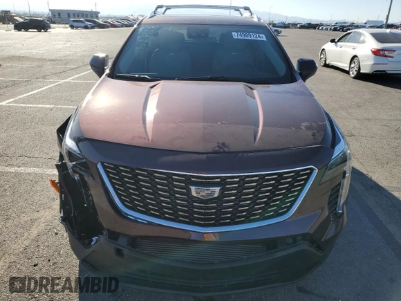 2023 Cadillac XT4 AWD Luxury with VIN 1GYFZBR42PF107893, listed as a Copart auction lot 74989124 with 9,579 mi miles and Salvage Title. Bid and sale history available at carsss.com. Image 5.