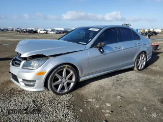2014 Mercedes-Benz C 250 Sport with VIN WDDGF4HB6EA956715, listed as a Copart auction lot 49494805 with 71,034 mi miles and Salvage title. Bid and sale history available at DreamBid. Image 1.