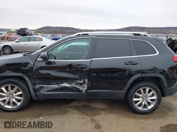 2014 Jeep Cherokee Limited z VIN 1C4PJMDS3EW152969, wystawiony jako IAAI lot #41541632 z przebiegiem 167 706 mil mil oraz . Historia ofert i sprzedaży dostępna na DreamBid. Obrazek 13.